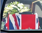  ??  ?? Hero John Jenkins’ flag-draped coffin