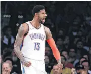  ?? [AP PHOTO] ?? Paul George celebrates after scoring two of his game-high 37 points Wednesday in the Thunder’s 107-100 win against the Lakers in Los Angeles.