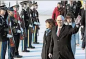  ?? KIM MIN-HEE/GETTY ?? Vice President Mike Pence and wife Karen arrive Thursday in South Korea. Pence met with South Korea’s president.