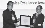  ??  ?? Agricultur­e Assistant Secretary Andrew Villacorta receives the Service Excellence Award.