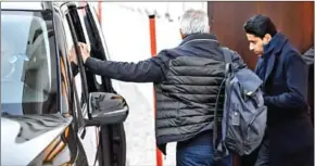  ?? AFP ?? Paris Saint-Germain president and beIN Media chief Nasser al-Khelaifi (right) leaves from a back door on the opening day of an appeal before the Swiss Federal Criminal Court in Bellinzona, southern Switzerlan­d, on March 7.