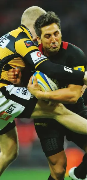  ?? PICTURE: Getty Images ?? Crunched again: Saracens’ Gavin Henson is tackled by Wasps’ Joe Simpson on Boxing Day in 2010