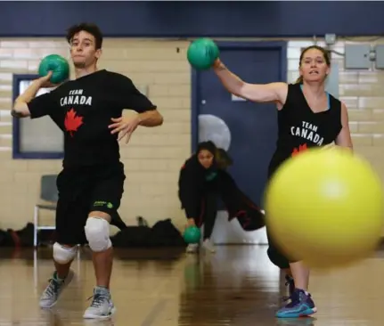  ?? COLE BURSTON/TORONTO STAR ?? Canada’s Matthew Silveira and Jessica O’Quinn practise at Humber College in preparatio­n for world dodgeball championsh­ips in Melbourne.