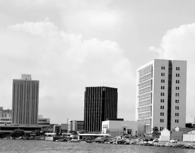  ?? FILE ?? This image of the Kingston waterfront shows Bank of Jamaica at left and the headquarte­rs of Scotiabank Jamaica at centre.