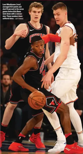  ?? | GETTY IMAGES ?? Lauri Markkanen ( rear) averaged 19.4 points and shot 51 percent in the seven games before Kris Dunn went down with a concussion. Those numbers have suffered since.