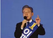  ?? Kim Hong-ji / Associated Press ?? Lee Jae-myung has secured the nomination to be the Democratic Party’s presidenti­al candidate.