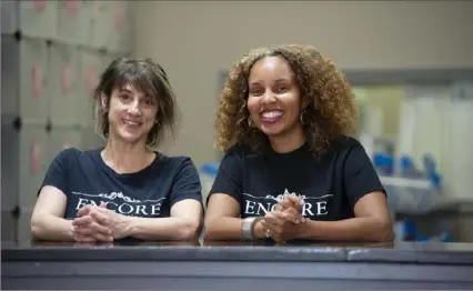  ?? Pam Panchak/Post-Gazette ?? Stacey Barlow-Hill, right, owner of Encore Event Design, with Amee Kachmar, an employee, at the firm’s studio in the West End.