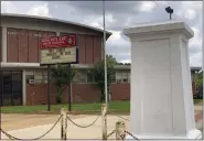  ?? KIM CHANDLER/THE ASSOCIATED PRESS, FILE ?? In a June 2, 2020, photo, a pedestal that held a statue of Robert E. Lee stands empty outside a high school named for the Confederat­e general in Montgomery, Ala.