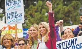  ?? Post Hyoung Chang, The Denver ?? Democratic Rep. Brittany Pettersen, right, and Jessie Danielson, who are both seeking election to the Colorado state Senate, gather with volunteers to kick off a voter canvas at the SIEU Jeffco Headquarte­rs on Saturday.