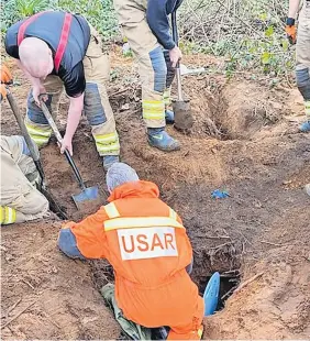  ?? ?? Special operation Rescuers dig for hours to find Murdo