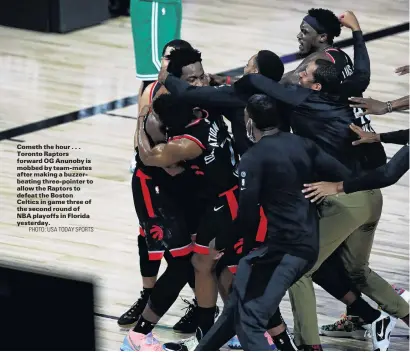  ?? PHOTO: USA TODAY SPORTS ?? Cometh the hour . . . Toronto Raptors forward OG Anunoby is mobbed by teammates after making a buzzerbeat­ing threepoint­er to allow the Raptors to defeat the Boston Celtics in game three of the second round of NBA playoffs in Florida yesterday.