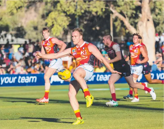  ??  ?? Suns forward Brandon Matera has a shot at goal against Melbourne, though the result left Gold Coast scratching around for answers. Picture: EMMA MURRAY