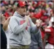  ?? AARON GASH — THE ASSOCIATED PRESS ?? Wisconsin head coach Paul Chryst claps on the sidelines during Saturday against Iowa in Madison, Wis.