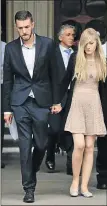  ?? Picture: AFP ?? HARD BATTLE: Chris Gard and Connie Yates, the parents of baby Charlie Gard, leave the Royal Courts of Justice