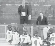  ?? LEAH HENNEL/Postmedia News ?? Head coach Mike Mondin, right, and assistant coach Curtis
Hunt are aiming to direct Canada to a victory Thursday.