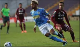  ?? SUBMITTED PHOTO - CONCACAF ?? Union midfielder Jose Martinez wheels away in possession from Deportivo Saprissa forward Jimmy Marin, right, in last week’s first leg in the Round of 16 of the CONCACAF Champions League.