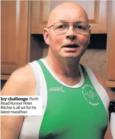  ??  ?? Icy challenge Perth Road Runner Peter Ritchie is all set for his latest marathon