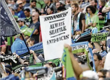  ?? TED S. WARREN / AP ?? Major League Soccer’s new policy that bans political displays at matches is drawing attention in the Pacific Northwest, where supporters’ culture is often intertwine­d with politics and social issues.