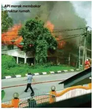  ??  ?? API marak membakar struktur rumah.