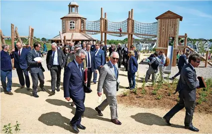  ?? Andrew Matthews/PA Wire ?? > Above and below right, Prince Charles at the opening of the Great Field play area at Poundbury in Dorset
