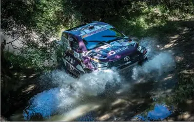  ??  ?? Nasser Al Attiyah and his co-driver Matthieu Baumel in their Toyota Hilux during the 283km route at the Andalucia Rally in Spain on Saturday.