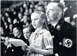  ??  ?? Gudrun with her father in 1938, and, right, in 1998. Below: the brooch her father gave her