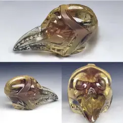  ??  ?? 15.6 ct. Plague mask in Oregon Sunstone, carved and photograph­ed by Samantha Rosenberg, GIA AJP.