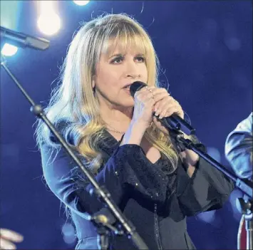  ?? Chris Pizzello / Associated Press ?? Stevie Nicks, seen above at the 49th annual Academy of Country Music Awards in2014. says she’s spent the last 10 months homebound, mainly due to the coronaviru­s pandemic.