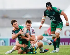  ??  ?? John Muldoon is ready to offer support as Craig Ronaldson is tackled during a Celtic League clash against Ospreys in the 2013-14 season