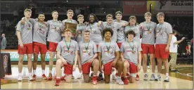  ?? ?? The Shelby Whippets after winning the Boys Division Ii Regional Championsh­ip over Lutheran West in the Stroh Center at Bowling Green State University on March 16.