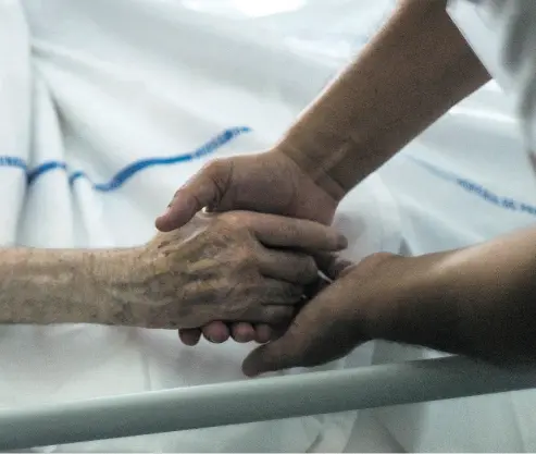  ?? FRED DUFOUR / AFP / GETTY IMAGES FILES ?? The push for better palliative care and the legalizati­on of medical assistance in dying are informed by the same values: treating suffering individual­s with compassion, write Shanaaz Gokool and Richard W. Ivey.