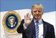  ?? PABLO MARTINEZ MONSIVAIS / AP ?? President Donald Trump waves as he arrives Wednesday in Bismark, N.D. While Trump is talking about bipartisan­ship on taxes, GOP leaders in Congress have made clear they’re pursuing a go-it-alone strategy.