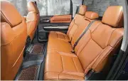  ??  ?? The long leather-trimmed back seat of the Toyota Tundra 1794 Edition CrewMax model has room for three adults to sit comfortabl­y.