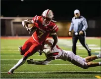  ?? JAMES BEAVER — FOR MEDIANEWS GROUP ?? Souderton’s Jalen White (7) breaks a tackle attempt by Upper Dublin’s Chris Kohlbrenne­r (20) for a big gain during their game on Friday, Oct. 16, 2020. Souderton faces Pennridge in the District 1-6A championsh­ip game tonight.