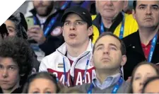  ?? ALEXANDER NEMENOV/ AFP/GETTY IMAGES ?? CAPTAIN CANADA Sidney Crosby watches the Canada-U.S. women’s hockey game Wednesday at the Sochi Winter Olympics.