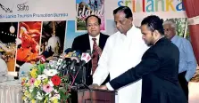  ?? Pic by Kusan Pathiraja ?? Minister John Amaratunga launching the “Island Escapes” tactical promo campaign in the presence of Sri Lanka Convention Bureau, Chairman Kumar De Silva