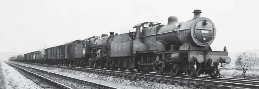  ??  ?? On 13 May 1939 a lengthy up fitted express freight is seen near Niffany sidings on the approach to Skipton. The unusual combinatio­n of locomotive­s shows the train engine to be Hughes/Fowler ‘Crab’ class 2-6-0 No 2771 of Leeds Holbeck shed, while the pilot engine is LMS Compound No 1069 of Carlisle Kingmoor, neither of which are in the best of external condition. The need for a pilot engine suggests that the train has run over the Settle & Carlisle and is making for Leeds. The Compound was completed in May 1924 at Derby Works and would serve until November 1955, while the ‘Crab’ emerged from Crewe Works in July 1927 and was condemned in October 1963.
