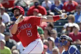  ?? MATT YORK — THE ASSOCIATED PRESS ?? The Angels’ Albert Pujols follows through on a solo home run against the Dodgers during the first inning of a spring training game, in Tempe, Ariz. Going into the 45th season since the designated hitter was approved by MLB owners for the American...