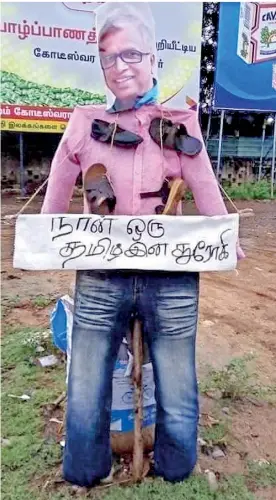  ??  ?? Sumanthira­n’s effigy near the Nallur Kandaswamy Kovil