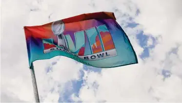  ?? Gregory Shamus/Getty Images ?? A view of a Super Bowl LVII flag outside State Farm Stadium in Glendale, Arizona.