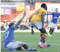  ??  ?? ON THE SPOT Bevis Mugabi handles for Gers’ first penalty