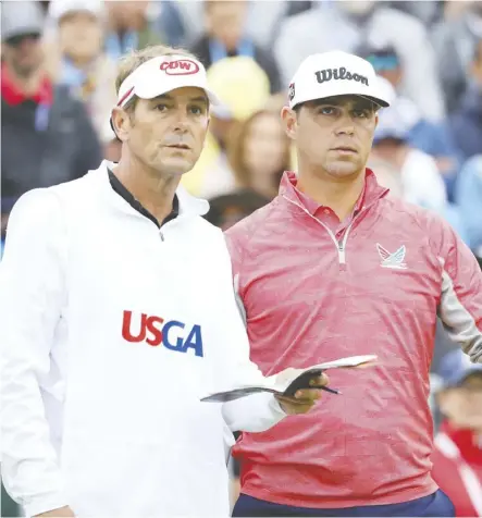  ?? Warren Little/Getty Images ?? Caddie Brennan Little and golfer Gary Woodland are back on tour at the Rocket Mortgage Classic in Detroit. Woodland captured the U.S. Open thanks in part to a crucial chip at Pebble Beach.