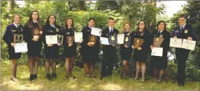  ?? COURTESY PHOTO ?? Lincoln High FFA members received numerous awards for their accomplish­ments during the 2014-2015 school year at the 88th Arkansas FFA State Convention in Hot Springs. Members include: Kelby Biswell, left, Kaitlyn Kelly, McKenna Cunningham, Lauren Cole,...