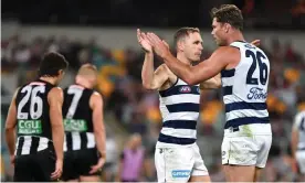  ?? (AAP Image/Darren England) NO ARCHIVING, EDITORIAL USE ONLY Photograph: Darren England/AAP ?? Tom Hawkins celebrates with Joel Selwood of the Cats after scoring a goal during the AFL Semi Final 2 match between the Geelong Cats and Collingwoo­d Magpies at the Gabba in Brisbane, Saturday, October 10, 2020.