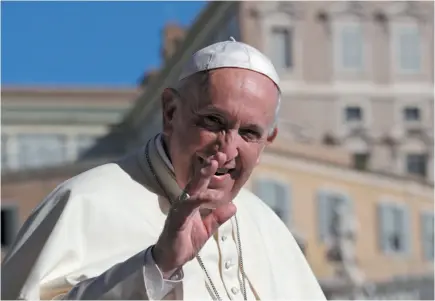  ?? AP PHOTO ?? Pope Francis arrives in St. Peter’s Square at the Vatican for his weekly general audience on Wednesday.