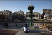  ?? MARK LENNIHAN — THE ASSOCIATED PRESS FILE ?? A woman sits on the Columbia University campus in New York.