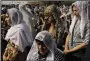  ?? (AP/Vasily Krestyanin­ov) ?? Armenian parishione­rs attend a national day of prayer for Artsakh (Nagorno-Karabakh) led by Armenian Catholicos Karekin II at the Armenian Apostolic Cathedral in Etchmiadzi­n, the seat of the Oriental Orthodox church outside in Yerevan, Armenia, on Sunday.