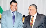  ?? HEMANS/PHOTOGRAPH­ER ?? Prime Minister Andrew Holness (left) and Opposition Leader Peter Phillips have a dose of the giggles during the official launch of the Political Parties Registrati­on Act last Monday.KENYON