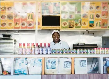  ?? VANESSA LEROY/THE NEW YORK TIMES ?? Glenroy Burke, or “Chef Shrimpy,” at his restaurant, the Jerk Cafe, in South Yarmouth, Massachuse­tts.