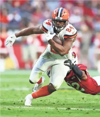  ?? MARK J. REBILAS / USA TODAY SPORTS ?? Browns running back Nick Chubb (above) will have additional support from Kareem Hunt this season.